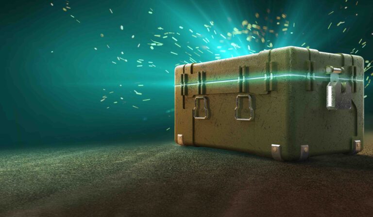 A suitcase is shown in the dark with light shining on it.